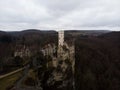 Aerial panorama view of medieval Schloss Lichtenstein castle on hill cliff edge in Echaz valley Honau Reutlingen Germany