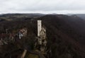 Aerial panorama view of medieval Schloss Lichtenstein castle on hill cliff edge in Echaz valley Honau Reutlingen Germany