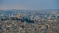 Aerial panorama view of Montmartre hill in the north of the center of Paris, France with white colored cathedral Sacre-Coeur. Royalty Free Stock Photo