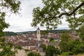 Aerial panorama view of old town cityscape of Schaffhausen from the Munot fortification in summer on a cloudy day with trees in Royalty Free Stock Photo