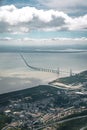 Aerial panorama view over the 25 de Abril Bridge. The bridge is connecting the city of Lisbon to the municipality of Royalty Free Stock Photo