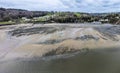 An aerial panorama view from over the sea across the beach at Wisemans Bridge in Pembrokeshire, South Wales