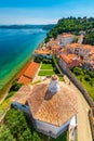 Aerial panorama view of Piran city, Slovenia. Look from tower in church. In foreground are small houses, Adriatic sea in Royalty Free Stock Photo