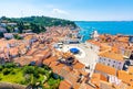 Aerial panorama view of Piran city, Slovenia. Look from tower in church. In foreground are small houses, Adriatic sea in Royalty Free Stock Photo