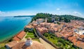 Aerial panorama view of Piran city, Slovenia. Look from tower in church. In foreground are small houses, Adriatic sea in Royalty Free Stock Photo