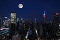 Aerial and panorama view of skyscrapers of New York City, Manhattan. view of night midtown of Manhattan with stars and moon Royalty Free Stock Photo