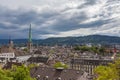 Aerial panorama view of Zurich old town and cityscape from view platform of ETH on a cloudy summer day, with Uetliberg and TV Royalty Free Stock Photo