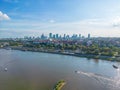 Aerial panorama of Warsaw, Poland over the Vistual river and City center in a distance Old town. Downtown skyscrapers cityscape. Royalty Free Stock Photo
