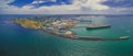 Aerial panorama of Williamstown suburb and industrial wharfs.