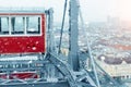 aerial panoramic citiscape view of Vienna from top of Prater amusement fair park ferris wheel during snowfall on cold snowy day. Royalty Free Stock Photo