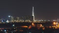 Aerial panoramic cityscape view of Ho Chi Minh city and the River Saigon, Vietnam with beautiful lights at night. Financial and