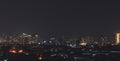 Aerial panoramic cityscape view of Ho Chi Minh city and the River Saigon, Vietnam with beautiful lights at night. Financial and Royalty Free Stock Photo