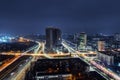 Aerial panoramic drone above roof view of Kiev night traffic road junction scene. Highway city at evening car light Royalty Free Stock Photo