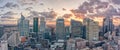 Aerial panoramic drone shot of La Defense skycraper in Paris CBD skyscraper complex with clouds during sunset