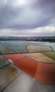 Aerial panoramic drone view of Burgas salt pans townscape at sunse.Saltworks industry.