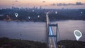 Aerial panoramic hyper lapse shot of Large cable-stayed bridge over Bosporus at sunset. Visual effects highlighting
