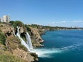 Aerial panoramic image of Lower Duden waterfall in Antalya, Turkey. Water falls drop off rocky cliff directly into Mediterranean Royalty Free Stock Photo