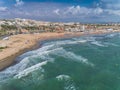 Aerial panoramic photo of La Mata Beach. Surfers ride the waves. Province of Alicante Costa Blanca. South of Spain 2 Royalty Free Stock Photo