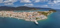 Aerial panoramic photo of picturesque seaside town of Ermioni built in peninsula with forest of Bistis at the end, Argolida, Royalty Free Stock Photo