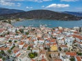 Aerial panoramic photo of picturesque seaside town of Ermioni built in peninsula with forest of Bistis at the end, Argolida, Royalty Free Stock Photo