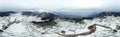 Aerial Panoramic shot of Odemis Bozdag and lake Golcuk with snow in winter season Royalty Free Stock Photo