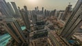 Aerial panoramic sunrise over big futuristic city all day timelapse. Business bay and Downtown Royalty Free Stock Photo