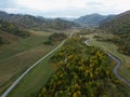 Aerial panoramic view of autumn mountain landscape. Drone shot Royalty Free Stock Photo