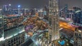 Aerial panoramic view of a big futuristic city night timelapse. Business bay and Downtown Royalty Free Stock Photo