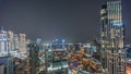 Aerial panoramic view of a big futuristic city night timelapse. Business bay and Downtown Royalty Free Stock Photo