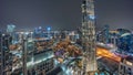 Aerial panoramic view of a big futuristic city night timelapse. Business bay and Downtown Royalty Free Stock Photo