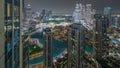 Aerial panoramic view of a big futuristic city night timelapse. Business bay and Downtown Royalty Free Stock Photo