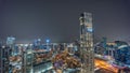 Aerial panoramic view of a big futuristic city night timelapse. Business bay and Downtown Royalty Free Stock Photo