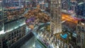 Aerial panoramic view of a big futuristic city night timelapse. Business bay and Downtown Royalty Free Stock Photo