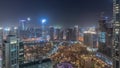 Aerial panoramic view of a big futuristic city night timelapse. Business bay and Downtown Royalty Free Stock Photo