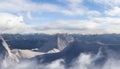 Aerial Panoramic View of Canadian Mountain covered in snow. Royalty Free Stock Photo