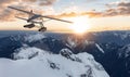 Aerial Panoramic View of Canadian Rocky Mountain Landscape with Seaplane Flying Royalty Free Stock Photo