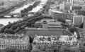 Aerial panoramic view of City skyline, football field and Seine river in Paris, autumn season Royalty Free Stock Photo