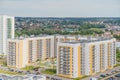 Aerial panoramic view dense of HDB apartment buildings at midday. High rises flat complex grass courtyard, green trees Royalty Free Stock Photo