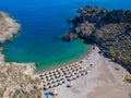 Aerial panoramic view of the famous rocky beach Melidoni in Kythira island at sunset. Amazing scenery with crystal clear water and Royalty Free Stock Photo