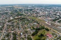 aerial panoramic view from great height of provincial town with a private sector and high-rise urban apartment buildings Royalty Free Stock Photo