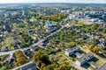 aerial panoramic view from great height of provincial town with a private sector and high-rise urban apartment buildings Royalty Free Stock Photo