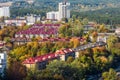 aerial panoramic view from great height of provincial town with a private sector and high-rise urban apartment buildings Royalty Free Stock Photo