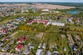 aerial panoramic view from great height of provincial town with a private sector and high-rise urban apartment buildings Royalty Free Stock Photo