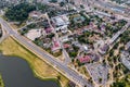 aerial panoramic view from great height of provincial town with a private sector and high-rise urban apartment buildings Royalty Free Stock Photo