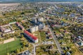 aerial panoramic view from great height of provincial town with a private sector and high-rise urban apartment buildings Royalty Free Stock Photo