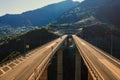 Aerial panoramic view on the highway bridge over the deep gorge Royalty Free Stock Photo