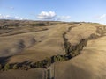Aerial panoramic view on hills of Val d`Orcia near Pienza, Tuscany, Italy. Tuscan landscape with cypress trees, vineyards, forest Royalty Free Stock Photo