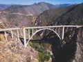 Aerial panoramic view of historic Bixby Creek Bridge along world famous Pacific Coast Highway 1 in summer sunny day , Monterey Royalty Free Stock Photo