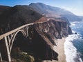 Aerial panoramic view of historic Bixby Creek Bridge along world famous Pacific Coast Highway 1 in summer sunny day , Monterey Royalty Free Stock Photo