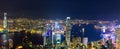 Aerial panoramic view of Hong Kong Island and Kowloon at night, Hong Kong city at night from the Victoria peak, China Royalty Free Stock Photo